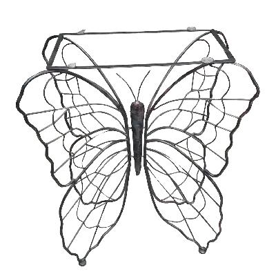 Mesa de hall a manera de mariposa en hierro y vidrio