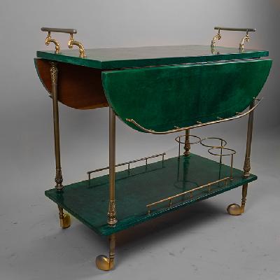 Aldo Tura. Carrito de servicio en madera, latón y pergamino de piel de cabra verde